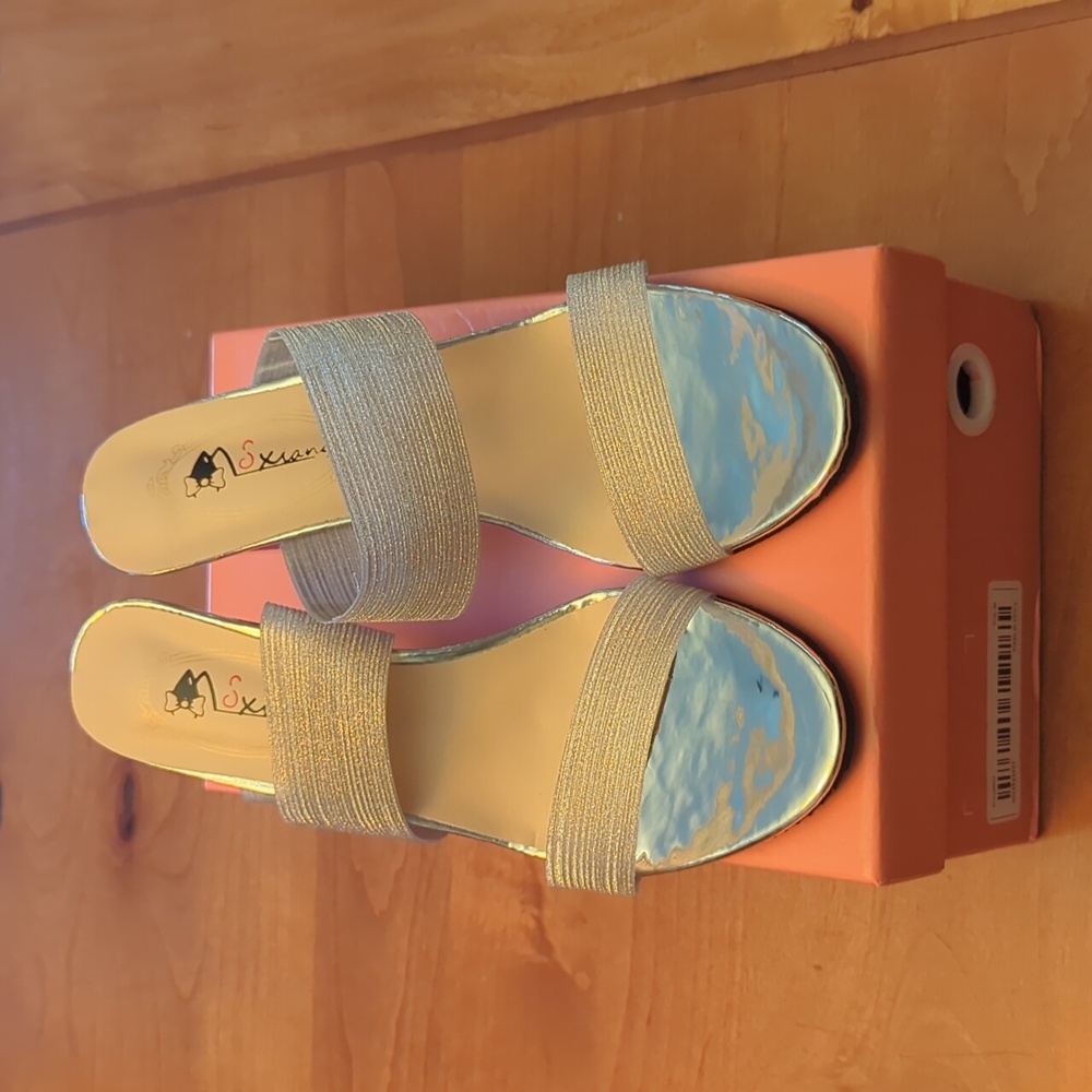 Brand New Slip-on heels in Silver Size 39, equivalent to a size US 7.5 - 8.